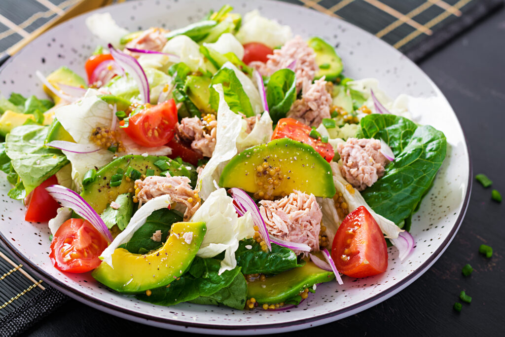 tuna fish salad with lettuce cherry tomatoes avocado red onions healthy food french cuisine x