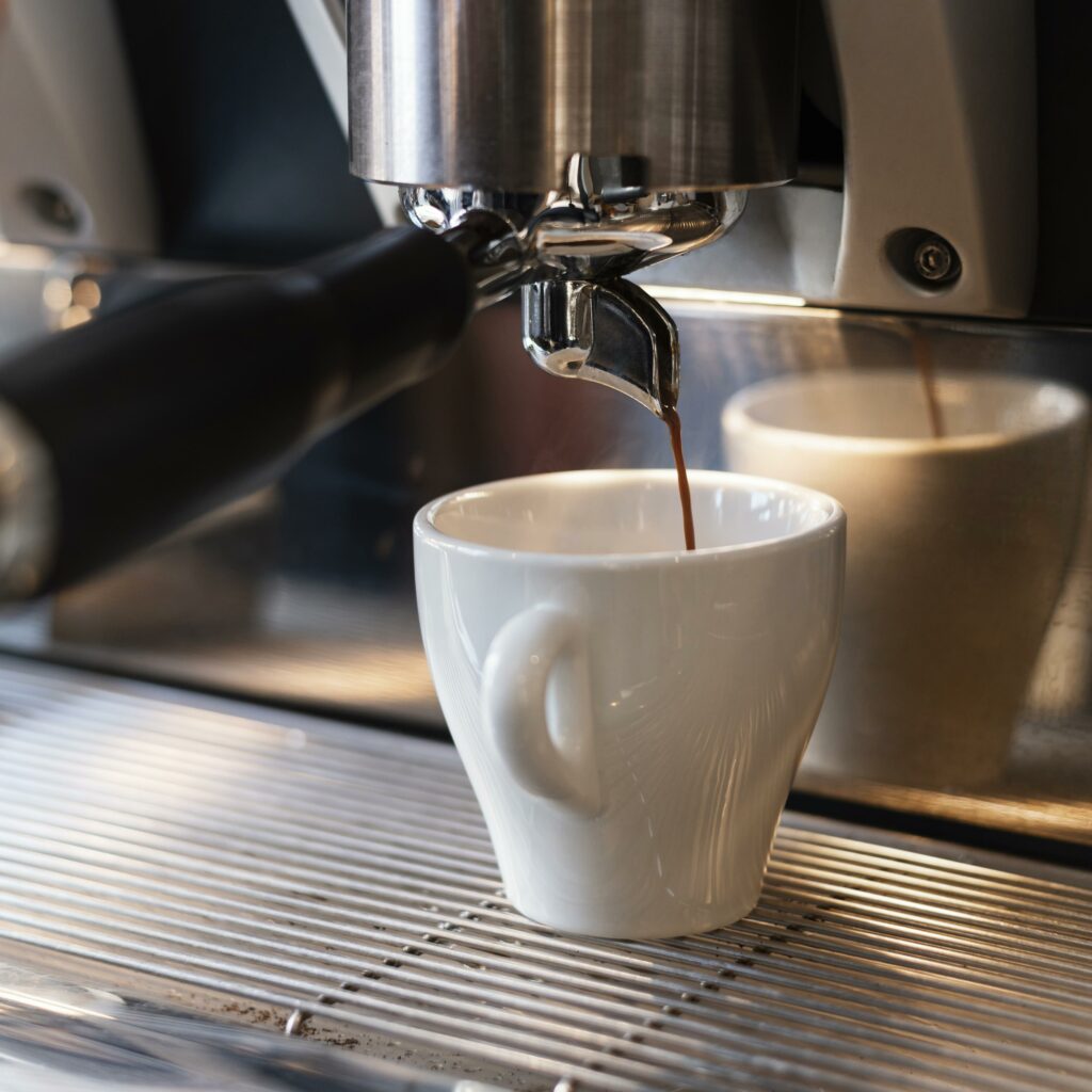 close up machine making coffee x